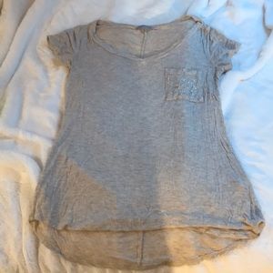 Women’s Cream colored shirt with gems on pocket